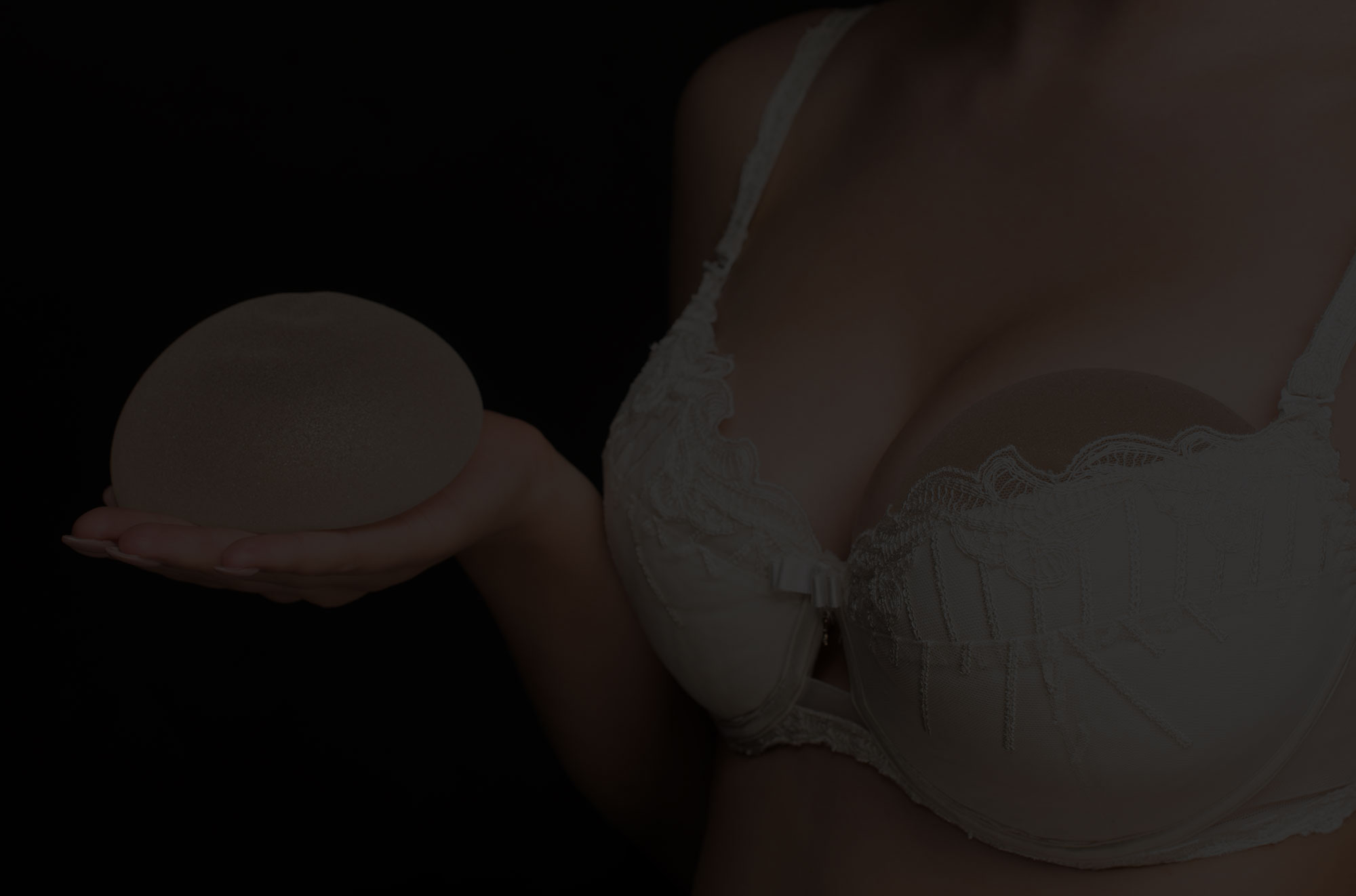 Beautiful woman with large breasts after breast augmentation.