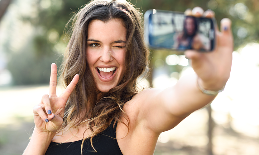 Woman taking a selfie of herself.